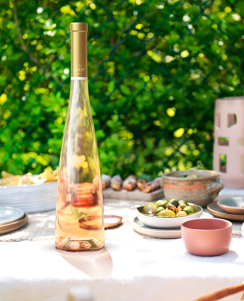 Azur authentic rose wine served in the table. 