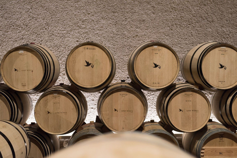 top wine barrels of azur wines with their logo